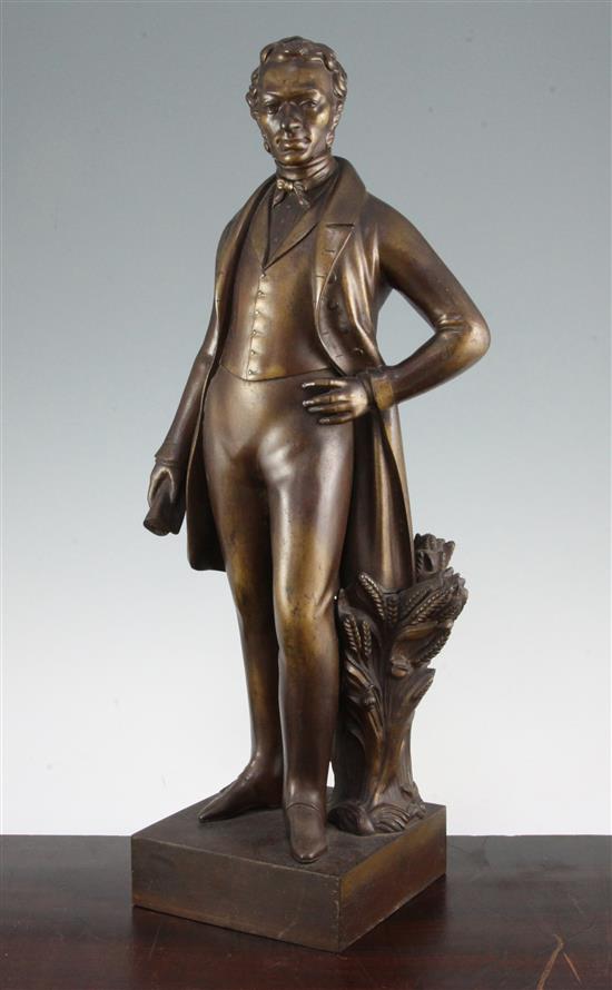 A 19th century Coalbrookdale bronzed cast iron figure of Sir Robert Peel, 20in.